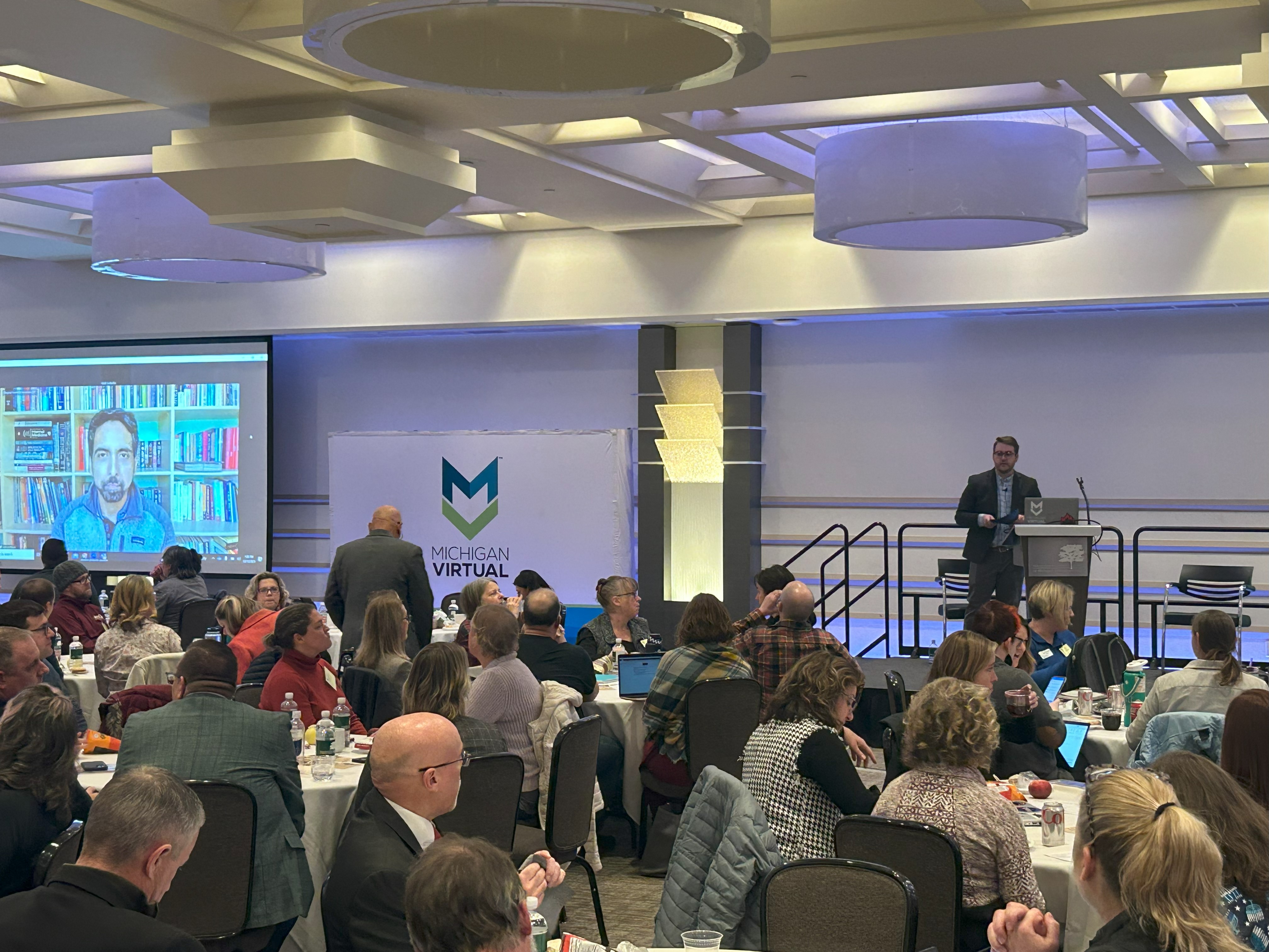 Justin Bruno and Sal Khan speaking to an audience at the AI Summit.